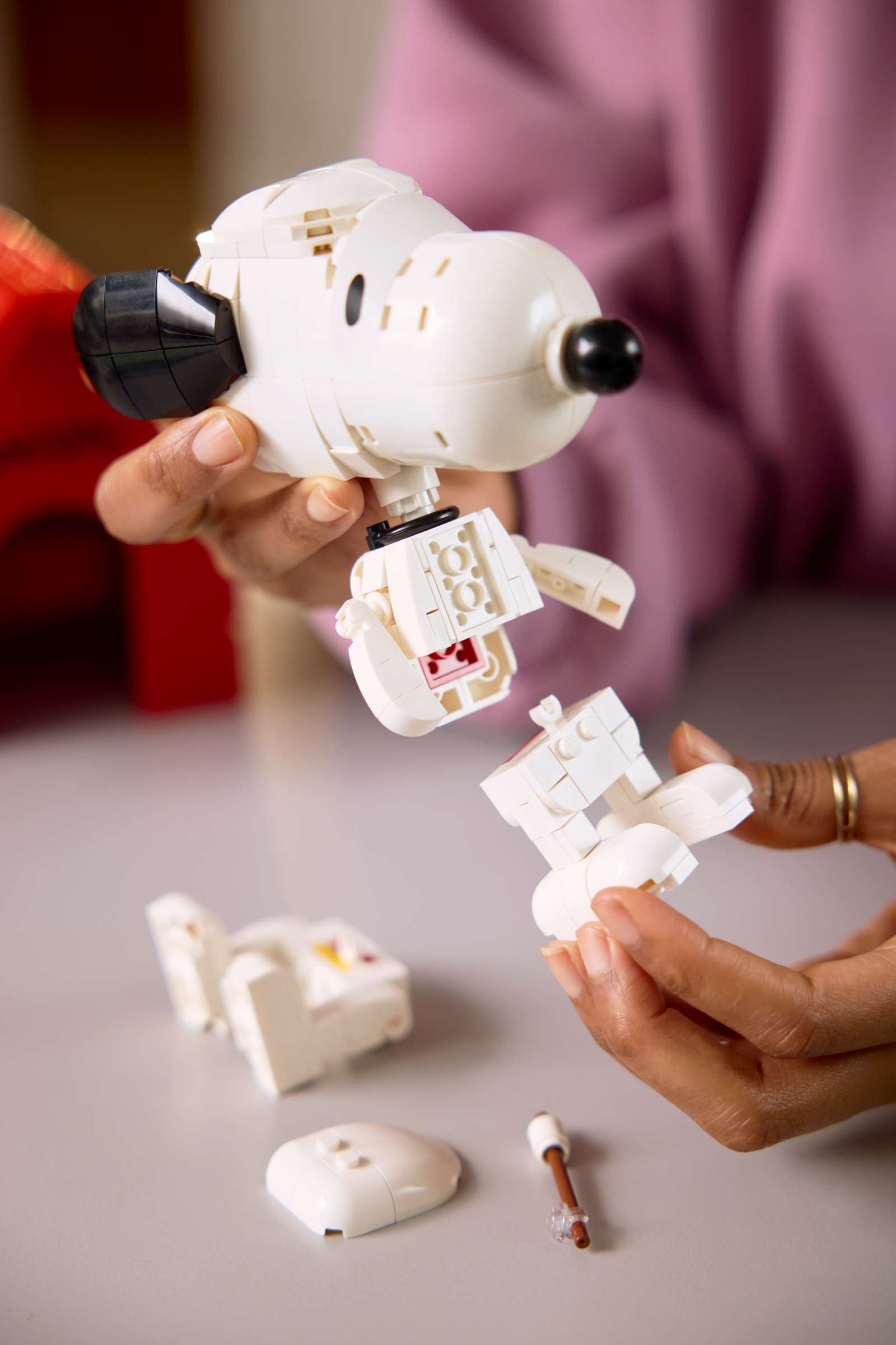 LEGO Ideas Peanuts: Snoopy's Doghouse being built