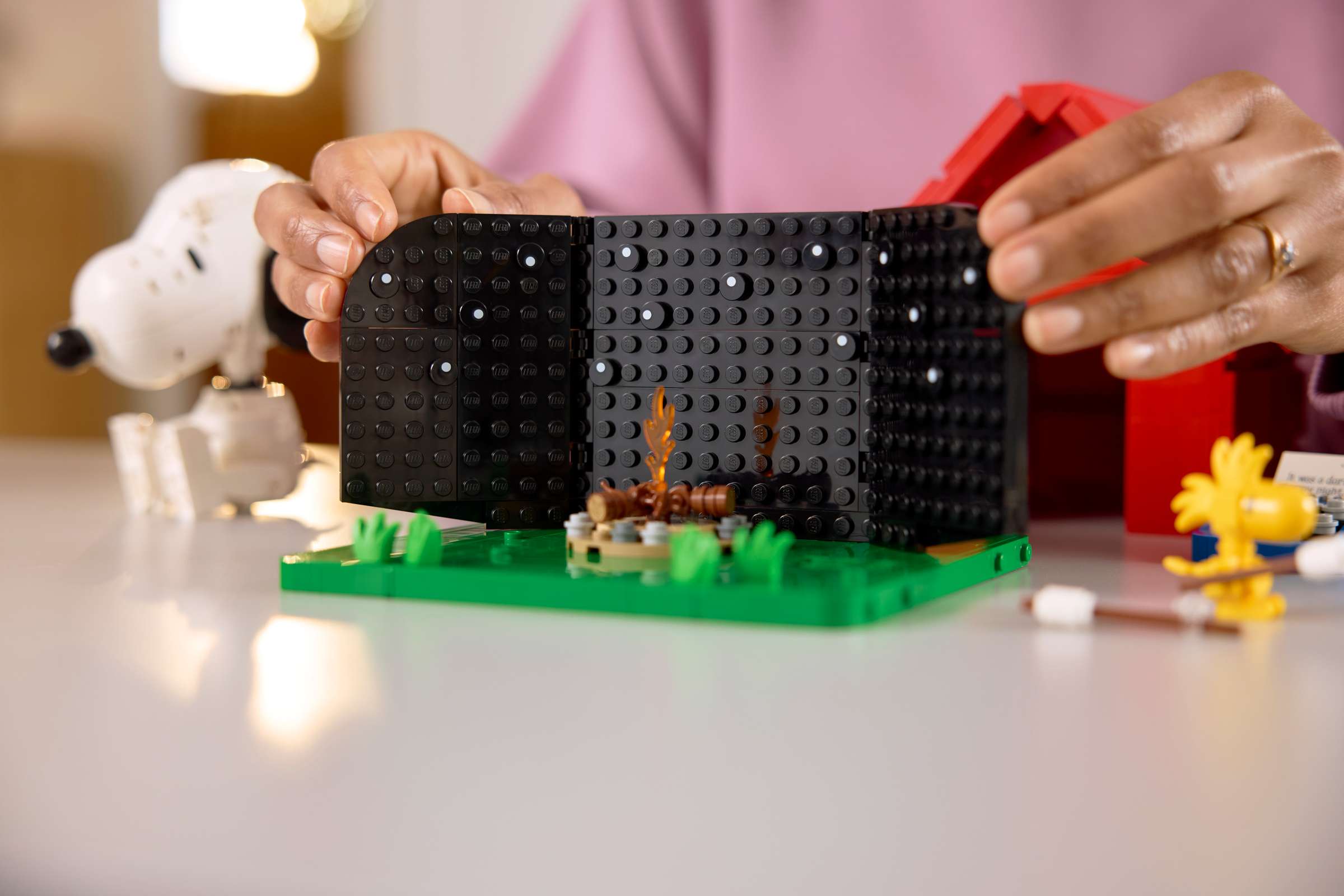 LEGO Ideas Peanuts: Snoopy's Doghouse being built