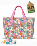 Beach tote bag with colourful cartoon cat print and candy pink carry handles