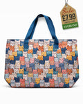 Beach tote bag with vibrant multicolour cat print and deep blue carry handles