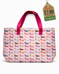 Beach tote bag with dachshund print on pink background and hot pink carry handles