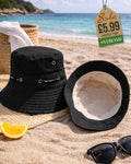 Black cotton sport bucket hat with cord hatband worn at the beach