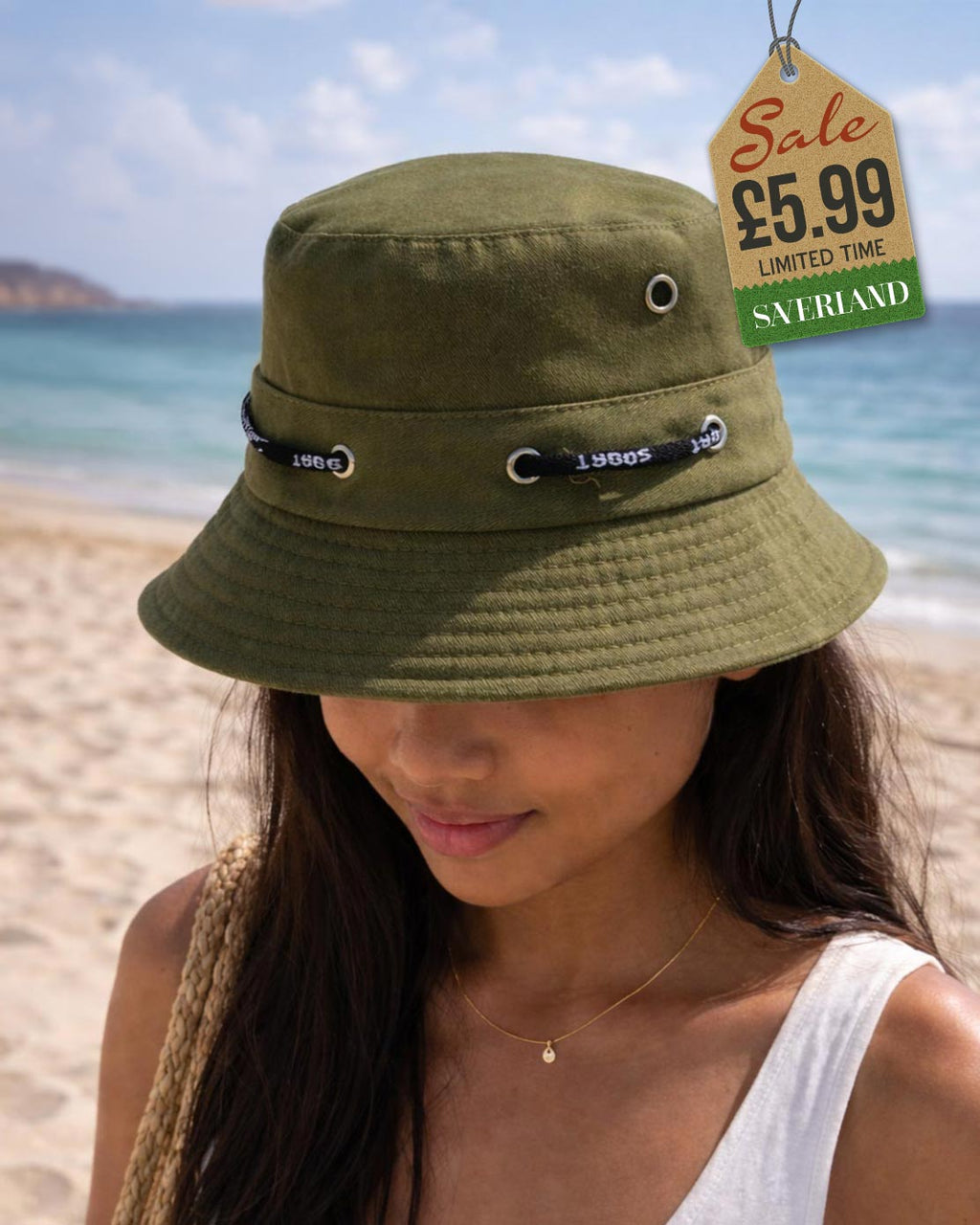 Olive green sport bucket hat worn at the beach by a model