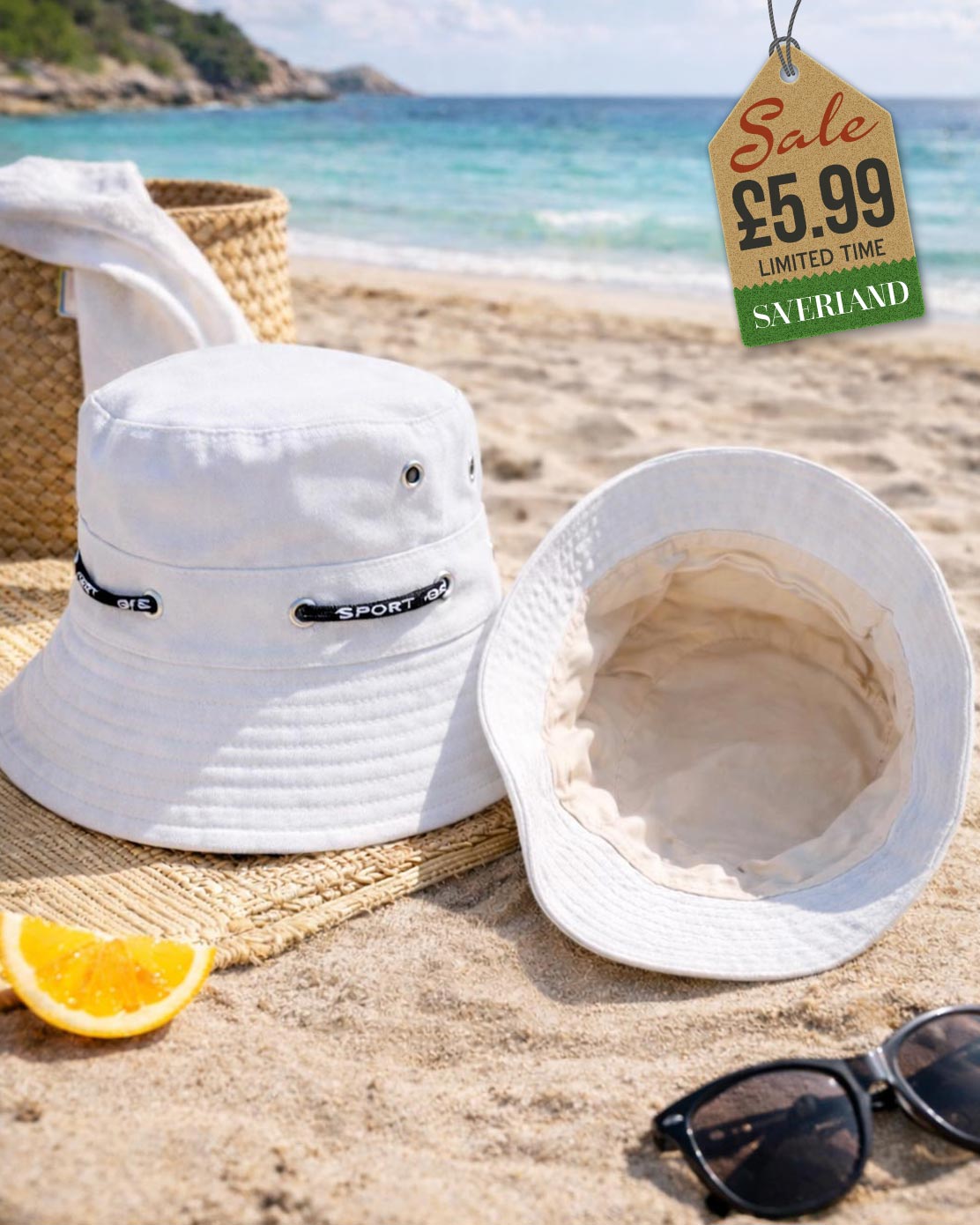 White cotton sport bucket hat with cord hatband shown upright and interior view on sand at beach