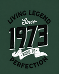 Forest green men's t-shirt with vintage graphic print reading Living Legend Since 1973 Aged to Perfection