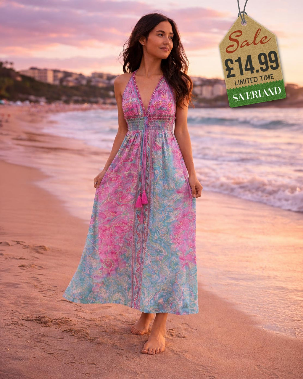 Pastel pink and blue paisley halter maxi dress, front view on beach