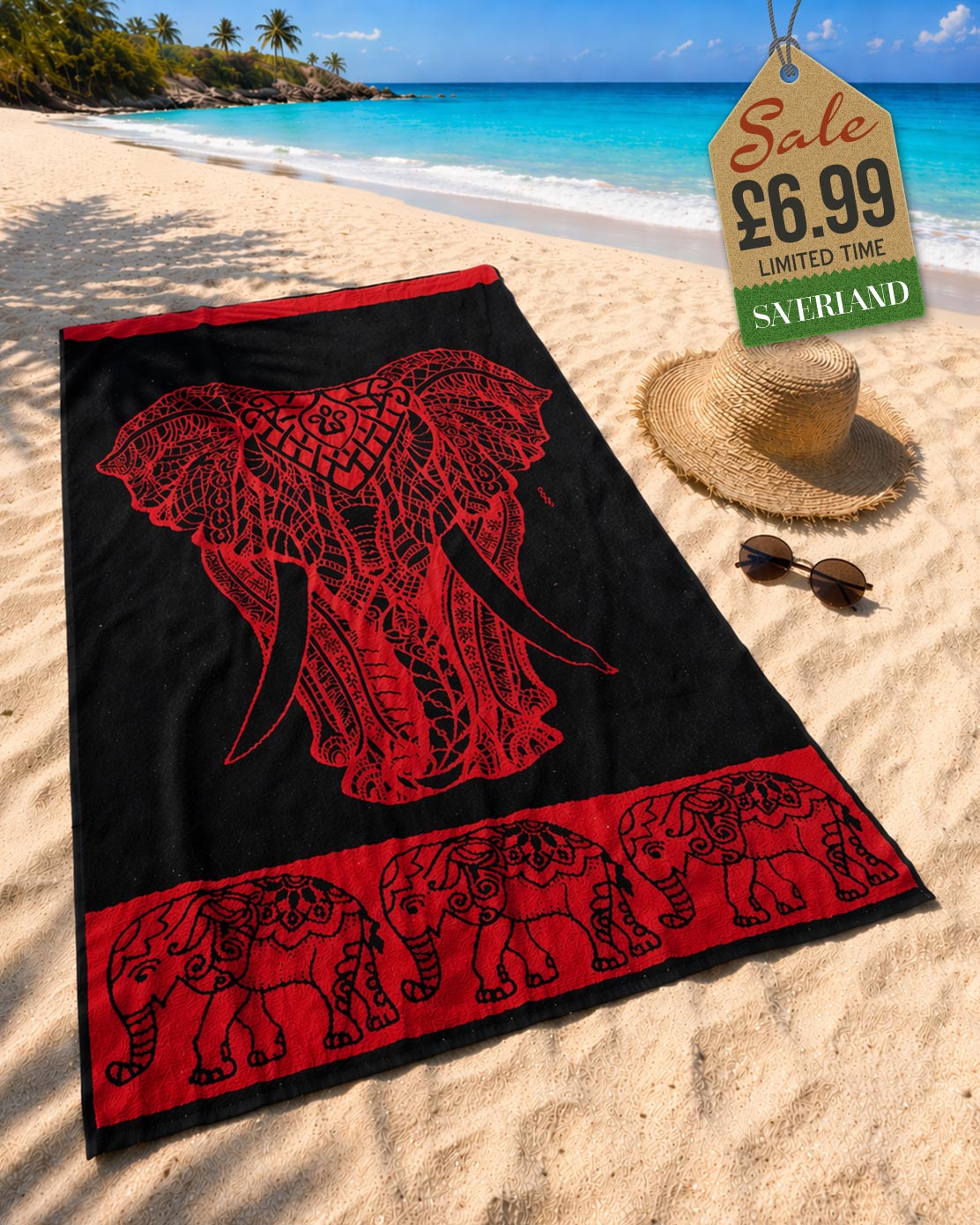 Deep Red tribal elephant head beach towel laid on sand at tropical beach