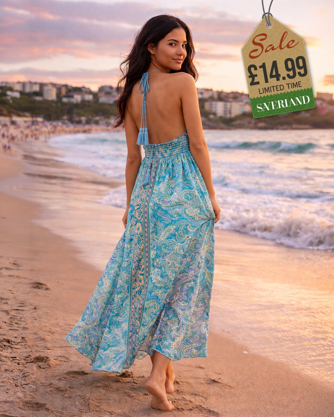 Turquoise paisley open-back halter maxi dress showing tie straps and tassel detail