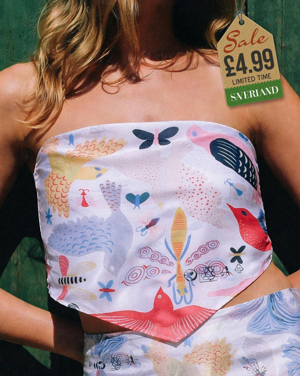 Light grey satin square scarf with illustrated birds, dragonflies and butterfly print shown tied and flat