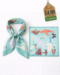 Teal birds and insects satin scarf worn as a strapless bandeau tube top