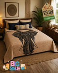 Large beige bed throw with intricate black mandala elephant print and black border, draped over a double bed in a boho-style bedroom