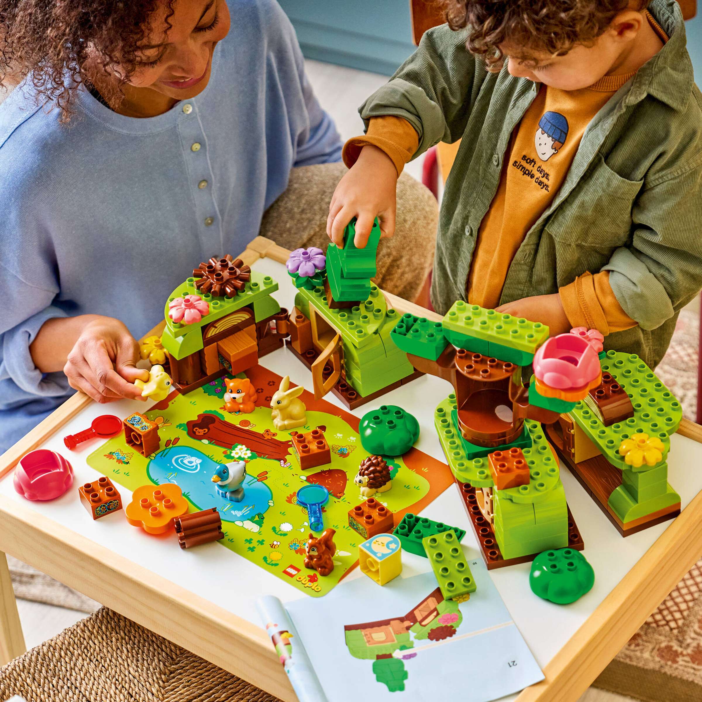 LEGO DUPLO Discovery Forest with Wild Animals being built