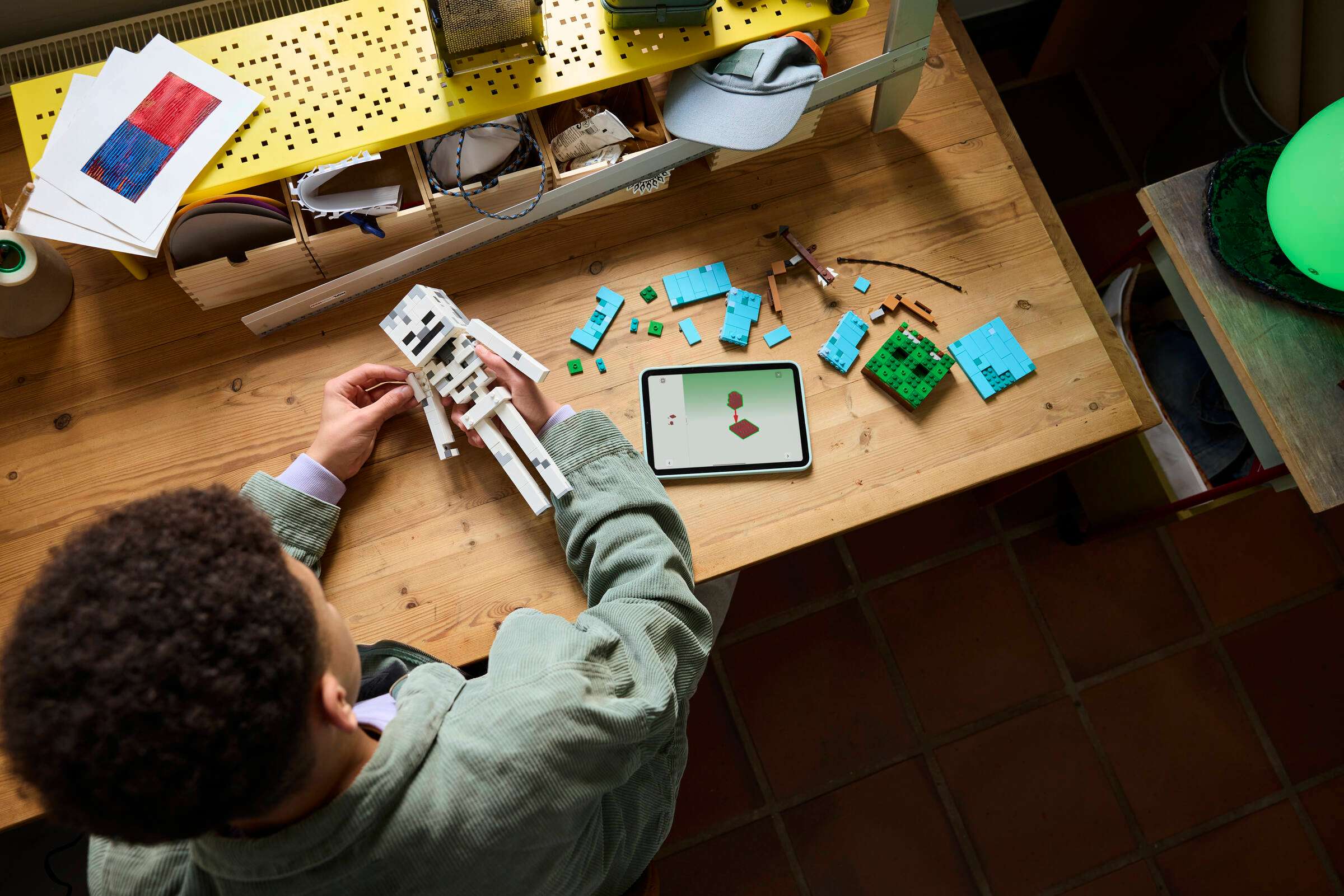 Child building the LEGO Minecraft Skeleton with the LEGO Builder app