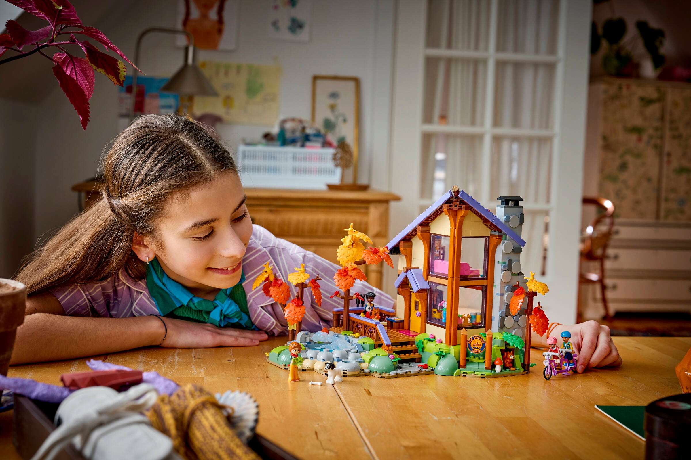 LEGO Friends Cozy Fall Forest Cabin 42705 play scene