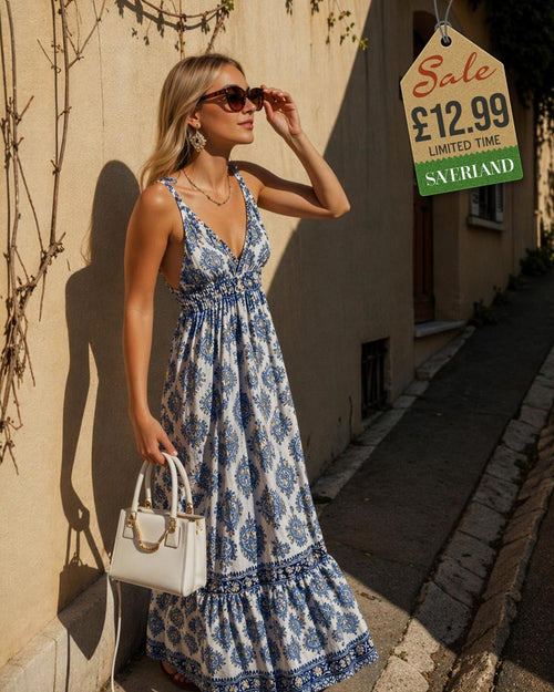 Blue and white damask boho maxi dress on model in sunny street