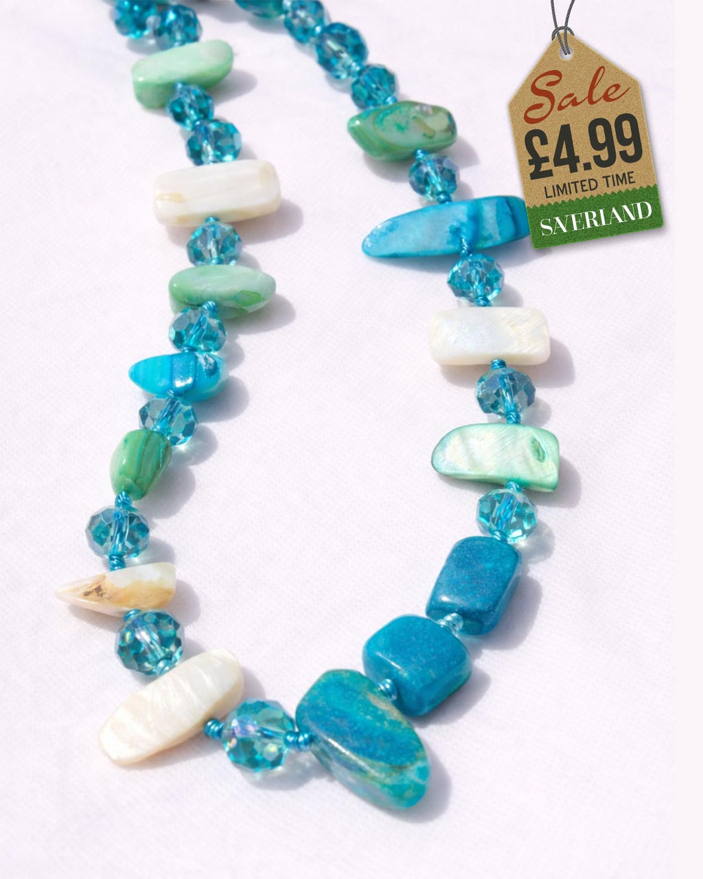 Mixed turquoise teal and green ocean tone shell chip and crystal bead necklace - flat product view