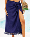 Plain navy blue beach sarong wrap skirt with tassel fringe hem tied at the hip