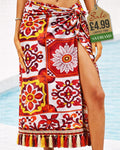 Red and white Sicilian tile patchwork beach sarong wrap with tassel fringe tied at the hip