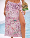 Pink and lilac paisley and floral patchwork beach sarong wrap tied at the hip