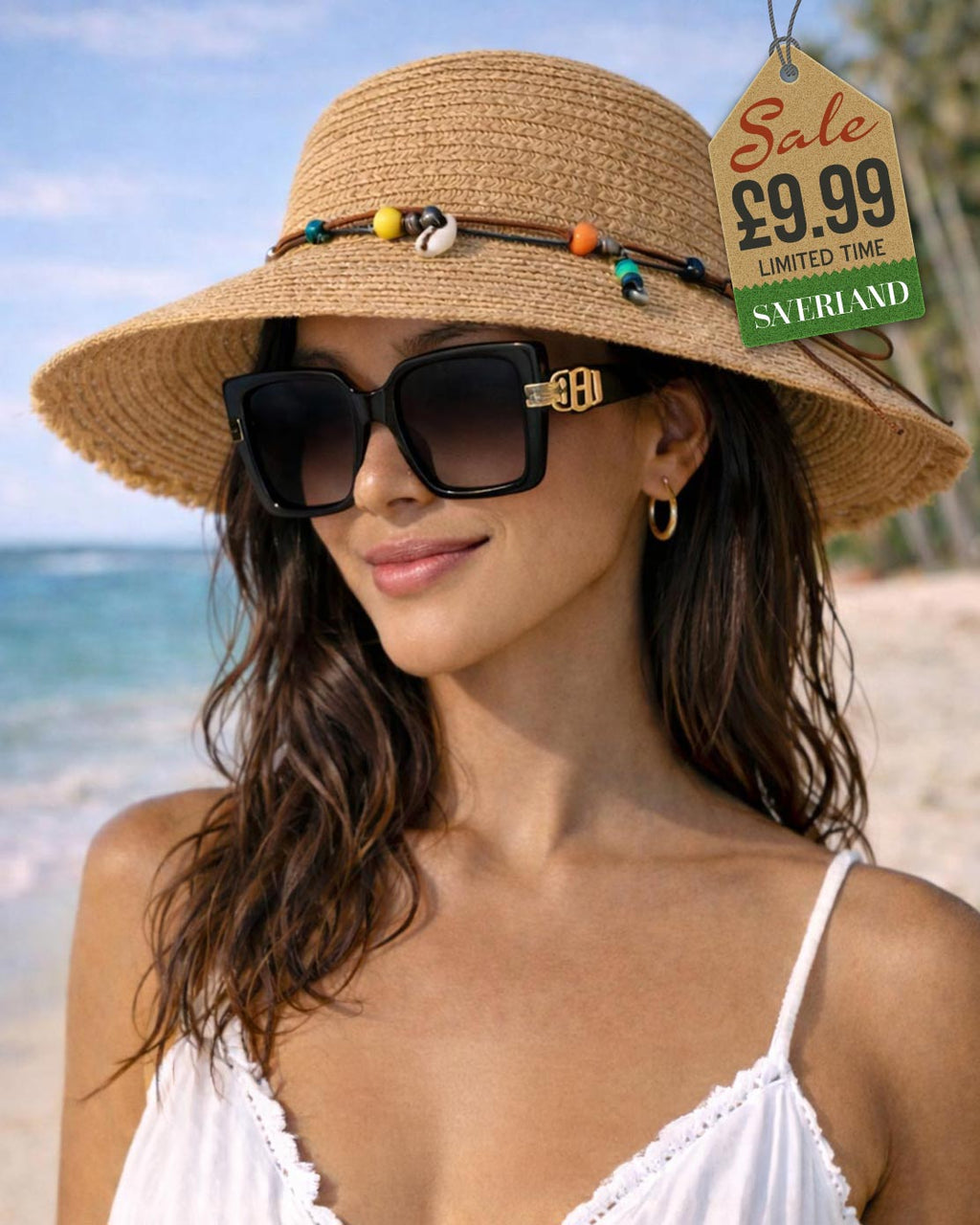 Woman wearing sleek black oversized sunglasses with gold accent at tropical beach with straw hat