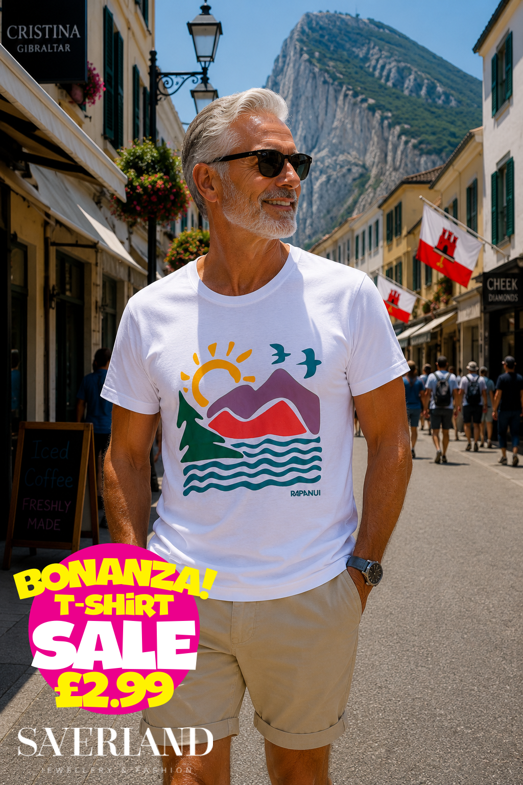 White Rapanui t-shirt with colourful mountain sunrise graphic featuring pine trees, waves, and birds