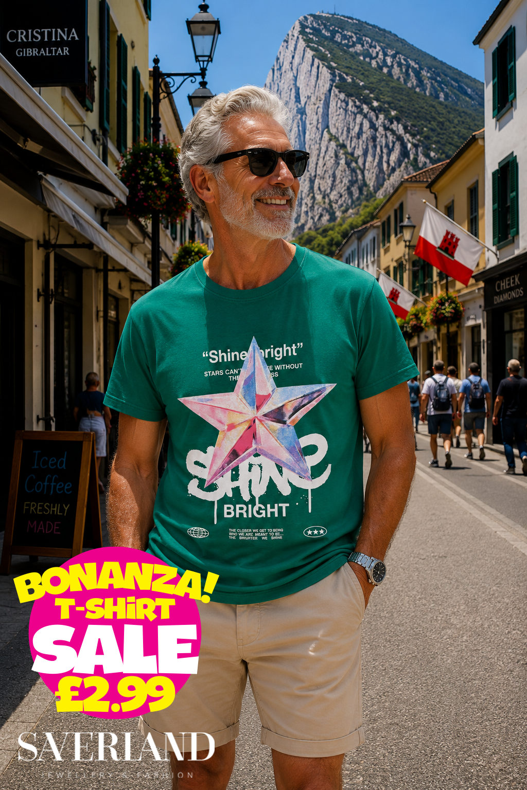 Men's teal green Shine Bright star graphic t-shirt worn on a sunny Gibraltar street