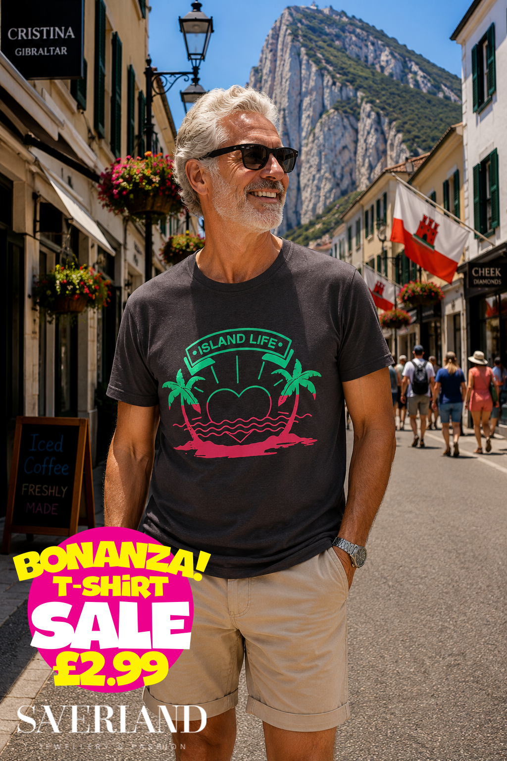Dark charcoal t-shirt with Island Life tropical graphic featuring palm trees, heart and sunset in pink and green