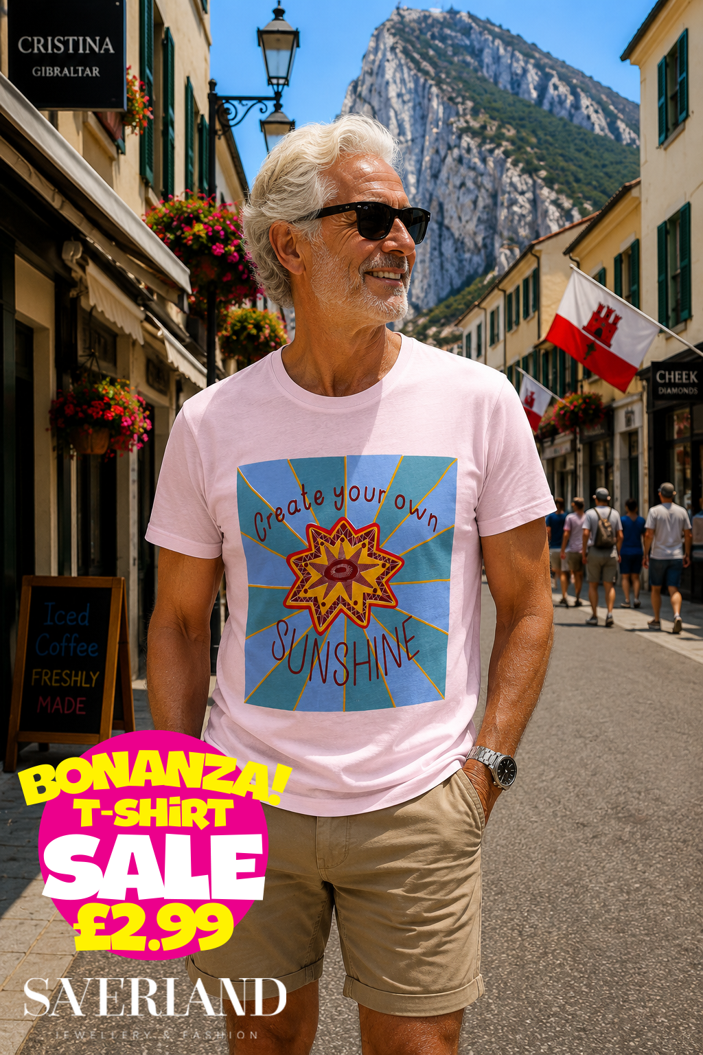 Light pink t-shirt with Create Your Own Sunshine graphic featuring a mandala star and radiating sunrays on a blue background, worn by a man in Gibraltar