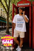 White oversized men's t-shirt with Make Your Dream Happen slogan in black and blue text