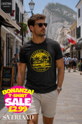 Black men's t-shirt with gold circular Navarre Beach Florida palm tree graphic, worn by a man in Gibraltar